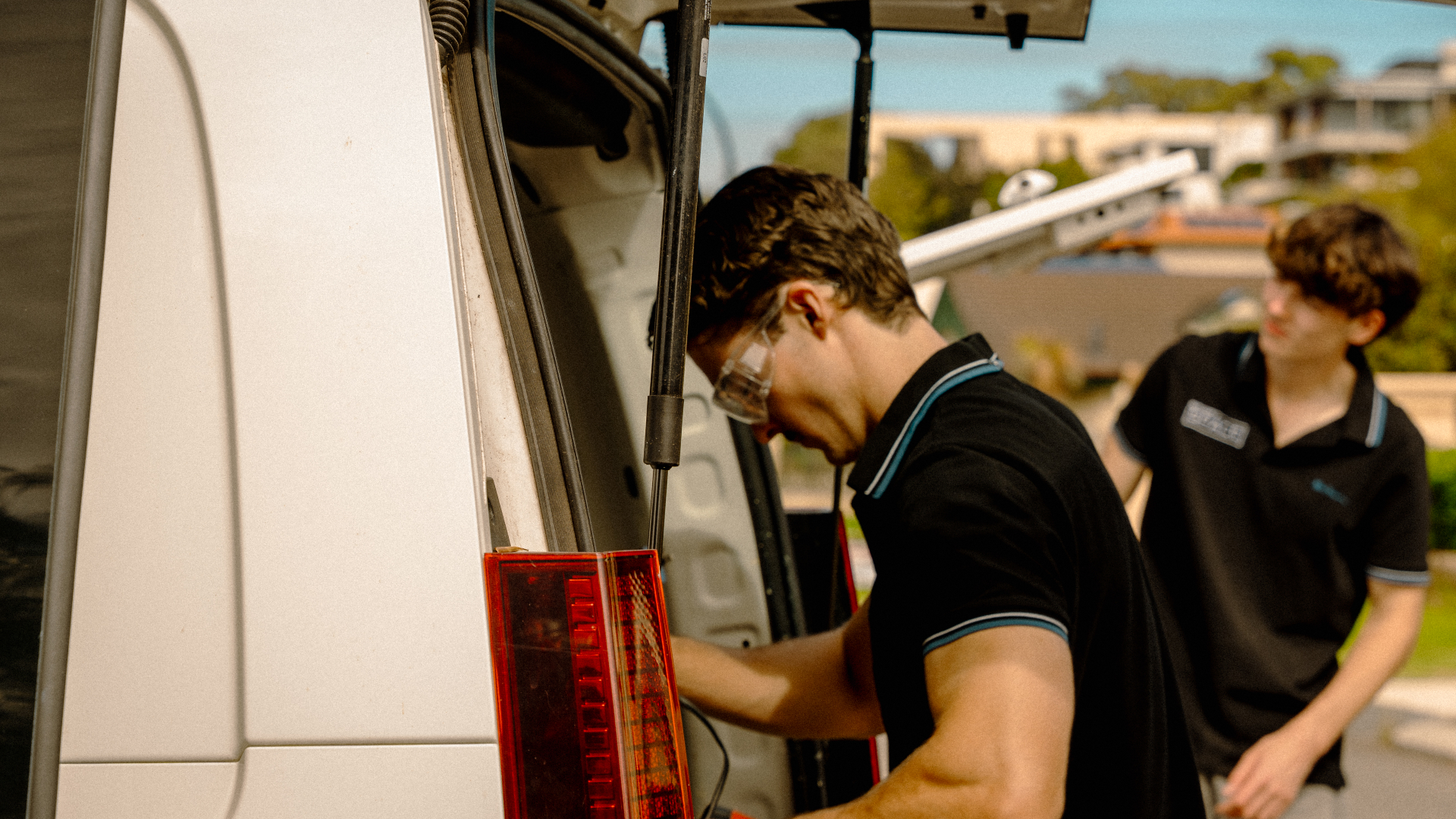 Technicians working on a residential install